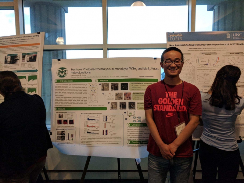 Li with his poster on recent advances with 2D materials